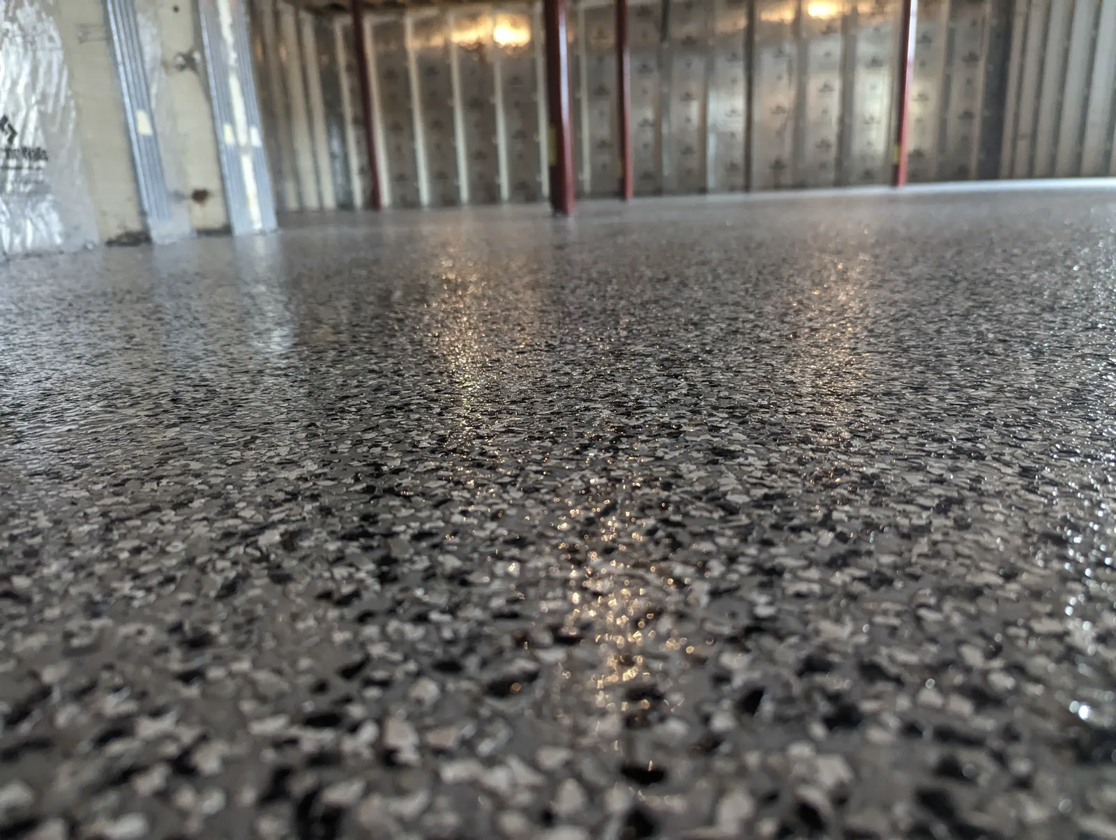 Industrial flake epoxy floor installed in a steel-framed building